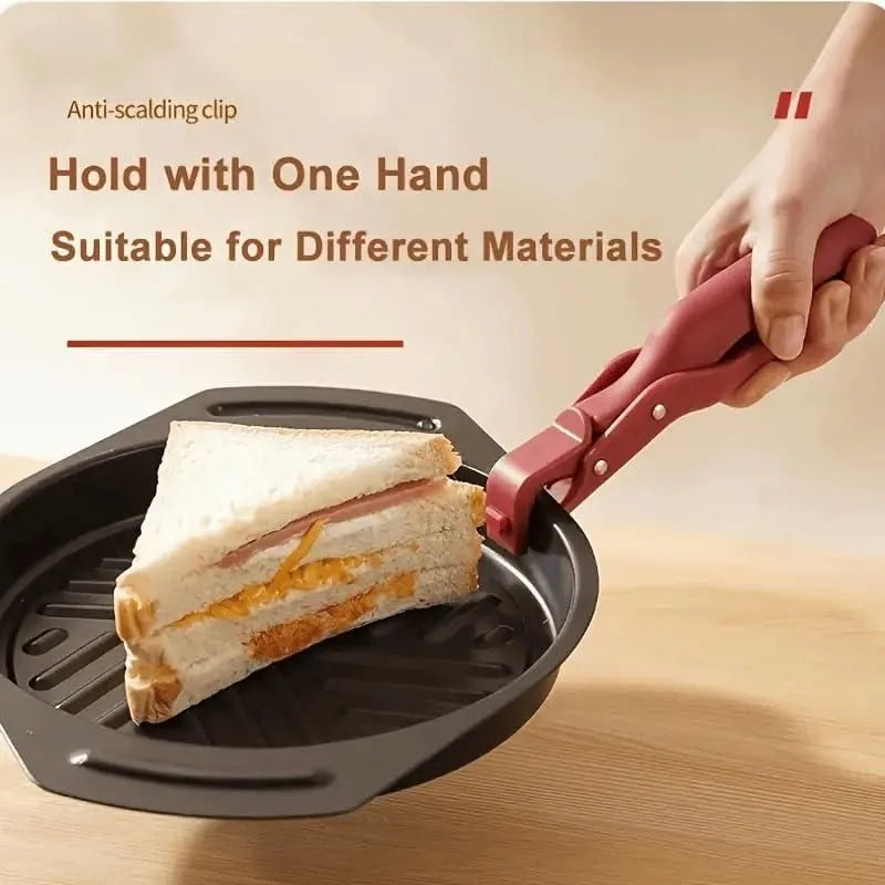 Red gripper lifting a dish by its rim